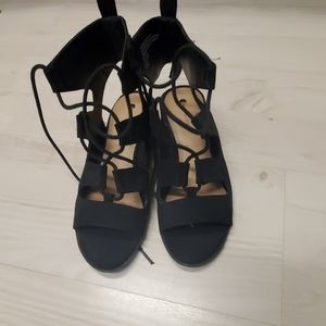 Black lace up sandal.